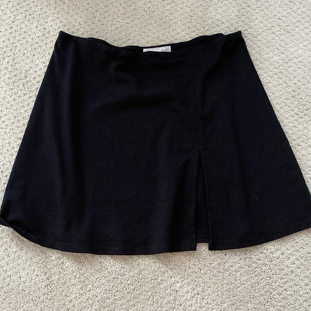Black light swim skirt with small slit
